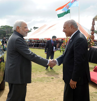 Modi being received on his arrival, at Nausori International Airport