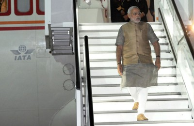 Before landing in US, Modi praises Obama