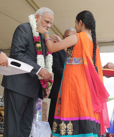 Modi being received on his arrival, at Nausori International Airport