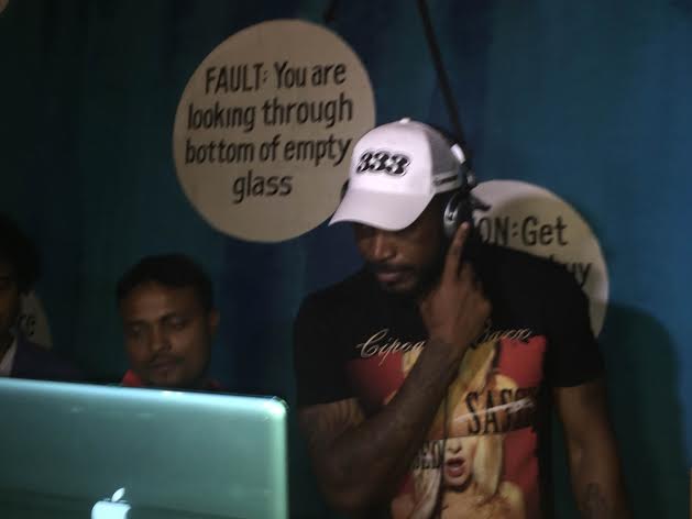 Gayle becomes DJ cum bartender at The Bar Stock Exchange