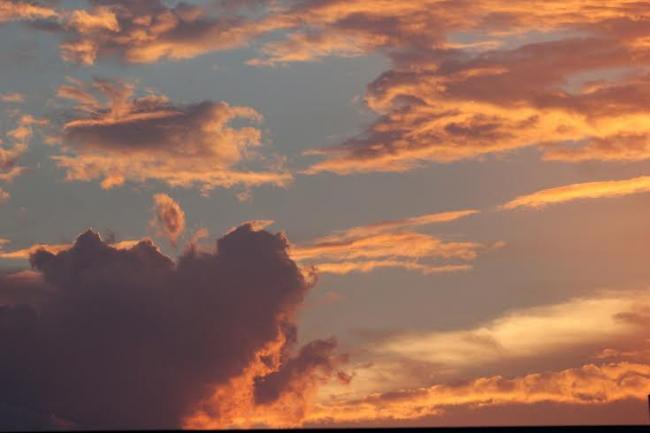 Clouds and raindrops through the 'lens' marking photography day