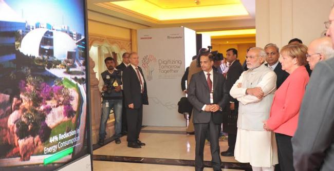 Narendra Modi and the German Chancellor, Dr. Angela Merkel visiting the Robert Bosch Engineering & Innovation Centre, in Bengaluru