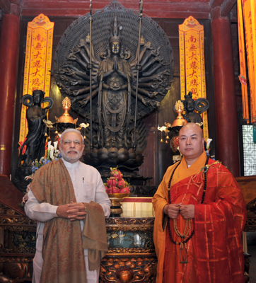  Modi interacting with the people near the Da Xing Shan Temple