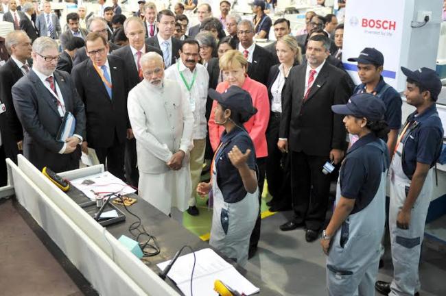 Narendra Modi and the German Chancellor, Dr. Angela Merkel visiting the Robert Bosch Engineering & Innovation Centre, in Bengaluru