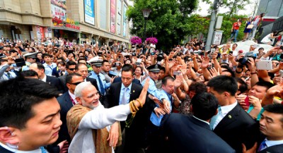  Modi interacting with the people near the Da Xing Shan Temple
