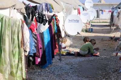 Thousands flee Syria for Turkey, escaping aggression between rival military forces UN refugee agency