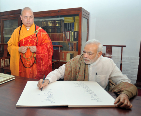  Modi interacting with the people near the Da Xing Shan Temple