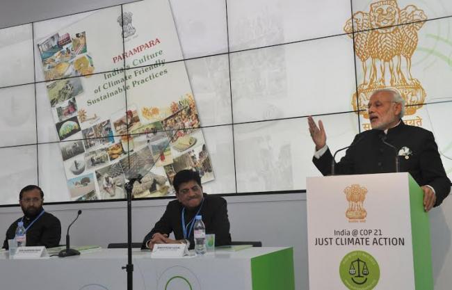 Narendra Modi being received by the President of France