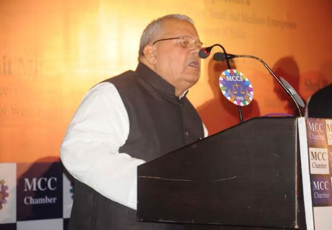Kalraj Mishra lighting the inaugural lamp