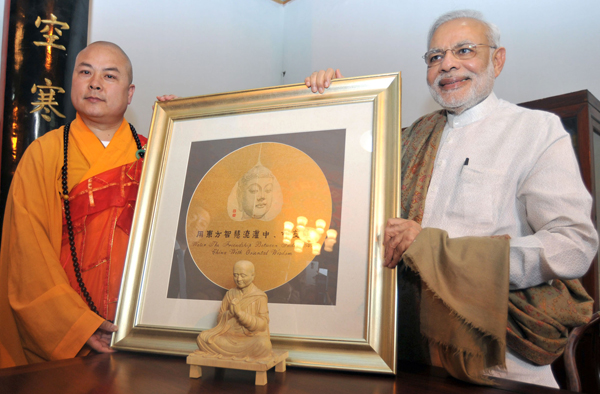  Modi interacting with the people near the Da Xing Shan Temple