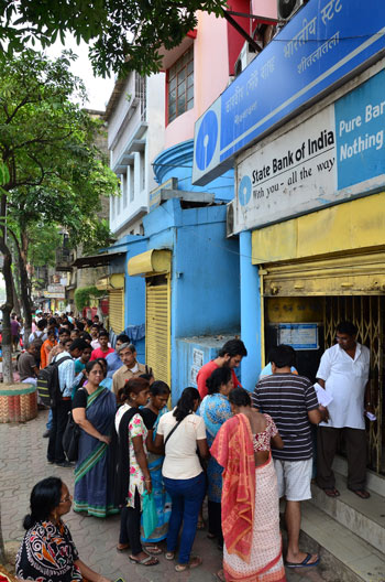 India copes with currency demonetization effect daylong