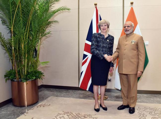 Narendra Modi meeting the Prime Minister of United Kingdom