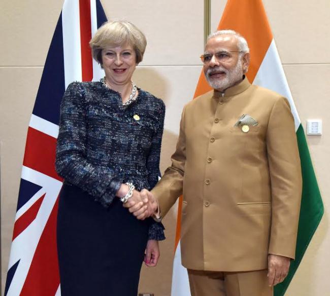 Narendra Modi meeting the Prime Minister of United Kingdom