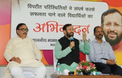 HRD Minister felicitates Class XII achievers who braved difficult circumstances 