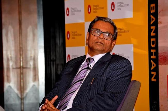 Amit Mitra releases book on Bandhan Bank