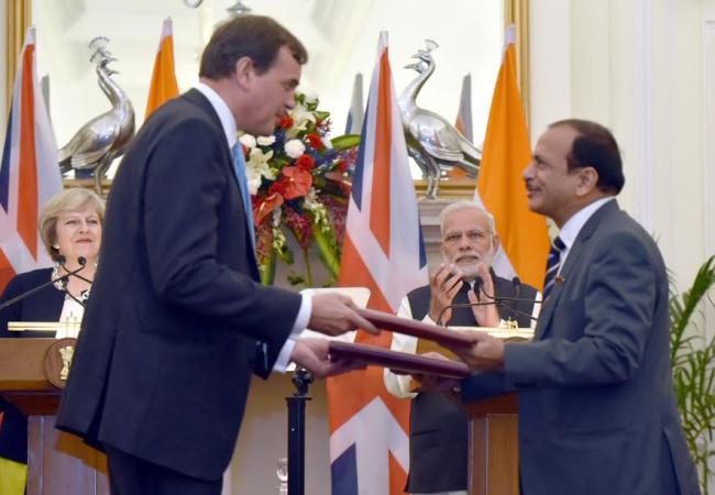 Narendra Modi meeting the Prime Minister of United Kingdom