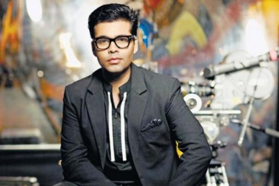 Karan Johar becomes father, introduces twins Roohi and Yash to world