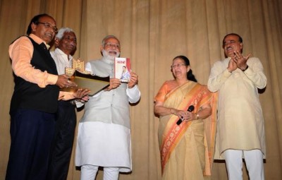 Narendra Modi unveils book written by LS Speaker