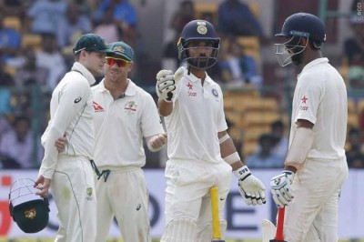 Pujara, Rahane fight, India take 126 runs lead