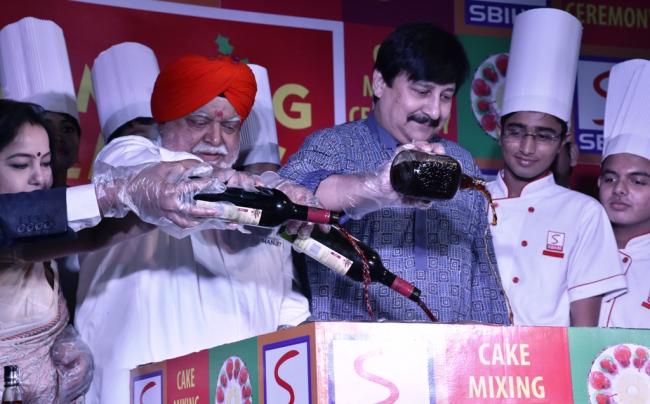 Actor Arjun Chakraborty and Chef Manjit Singh Gill join SBIHM students at their cake mixing ceremony