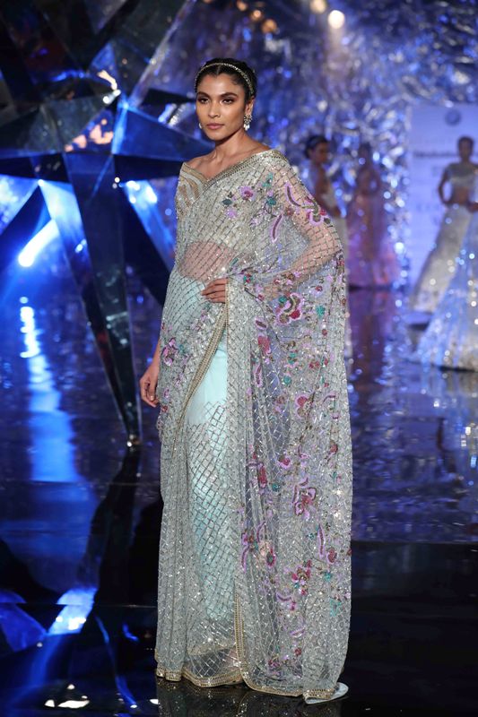 Models walk for Suneet Varma in India Couture Week