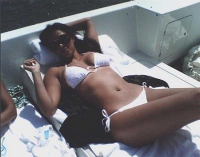 Kim Kardashian shares white bikini image of herself on social media
