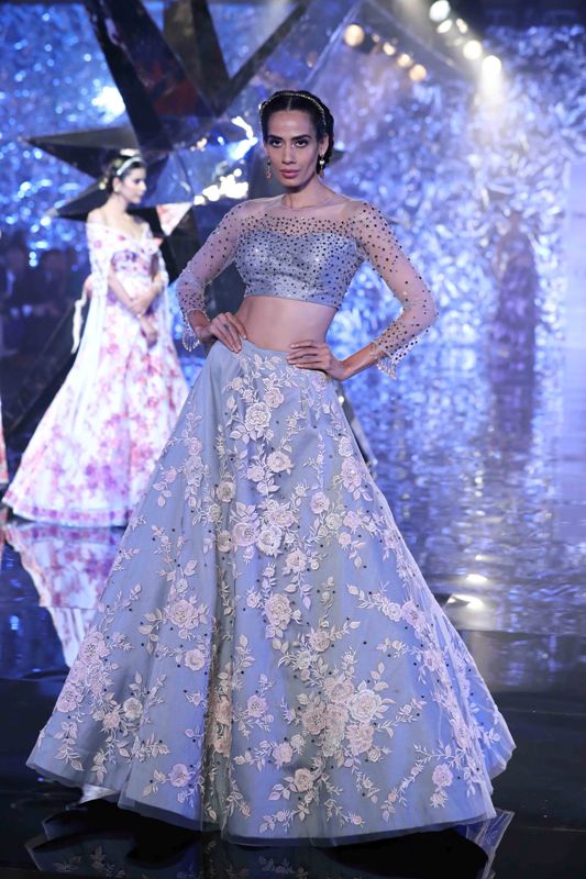 Models walk for Suneet Varma in India Couture Week
