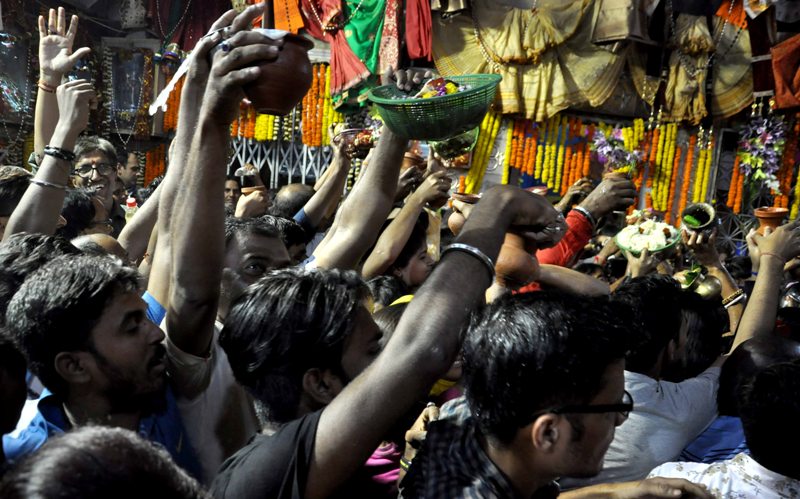 People gather in large numbers at temple for Maha Shivaratri