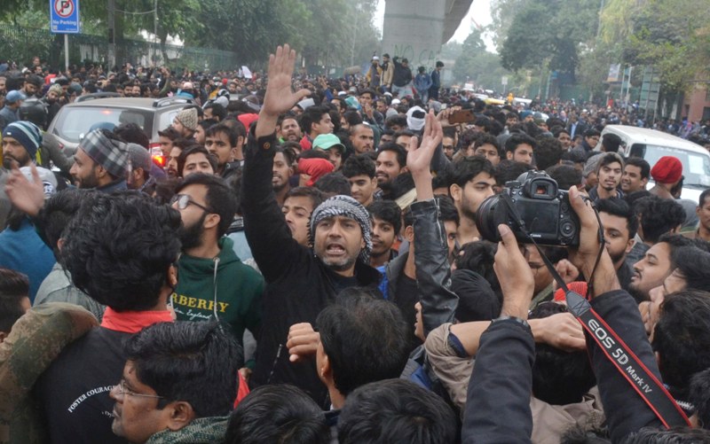 Students agitating against Citizenship Amendment Act  outside Jamia Millia Islamia University.