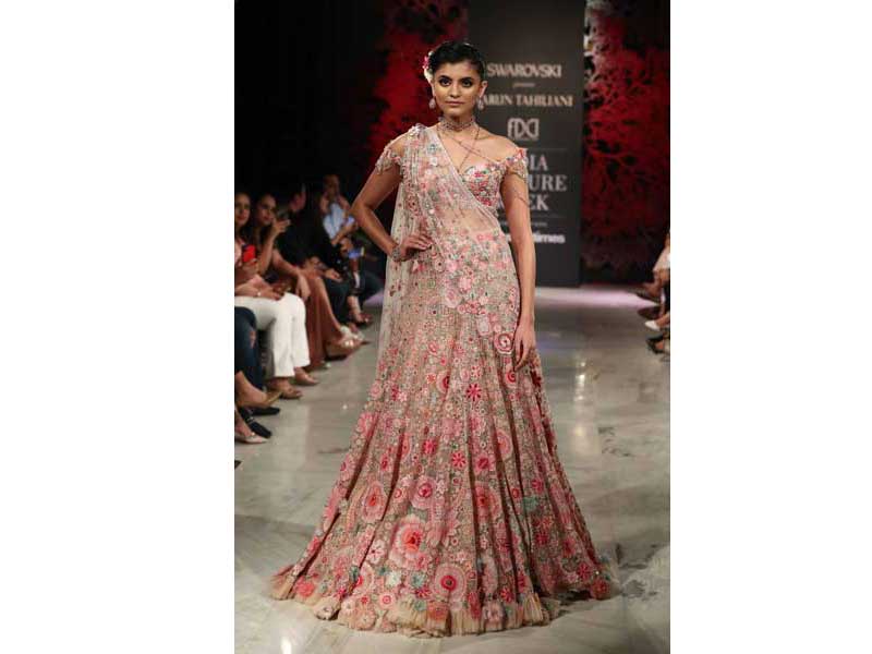 Models walk the ramp for Tarun Tahiliani's show