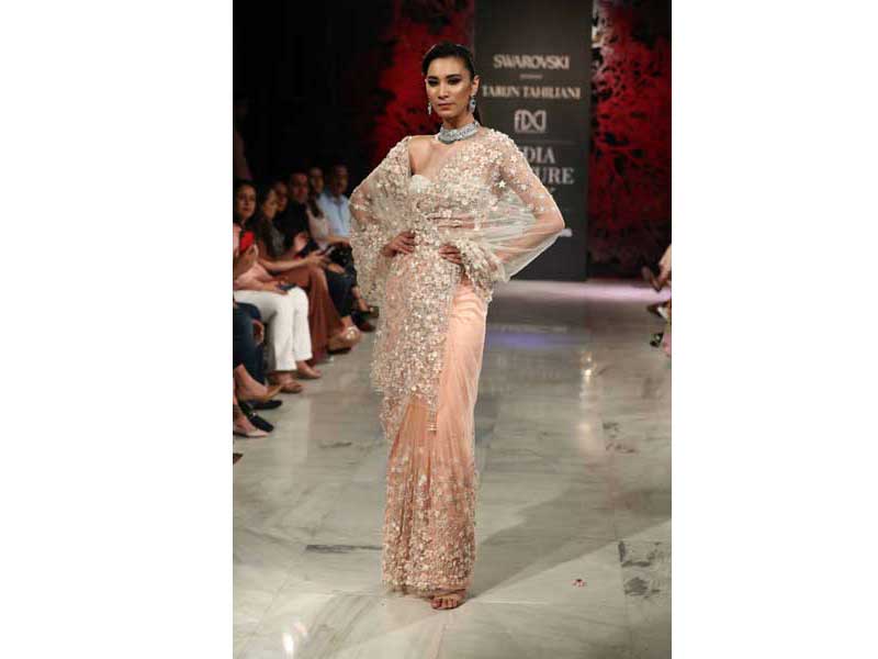 Models walk the ramp for Tarun Tahiliani's show