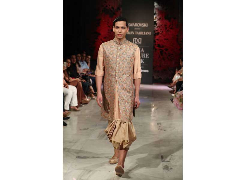 Models walk the ramp for Tarun Tahiliani's show