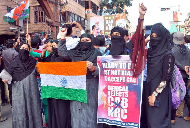 WestBengal Jamia Milia Inslamia students raise slogans during a protest demonstartion outside the university