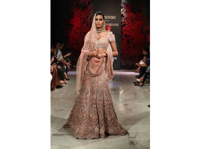 Models walk the ramp for Tarun Tahiliani's show