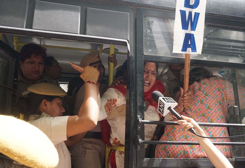 Members of All India Democratic Women's Association protest against clean chit to CJI 