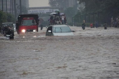 Twelve killed, nearly 15,000 flee home as floods, landslides hit western Indonesia