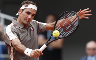 Roger Federer hits return at French Open in Paris