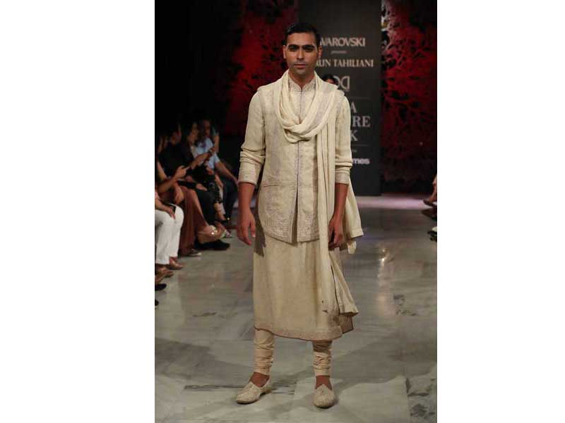 Models walk the ramp for Tarun Tahiliani's show