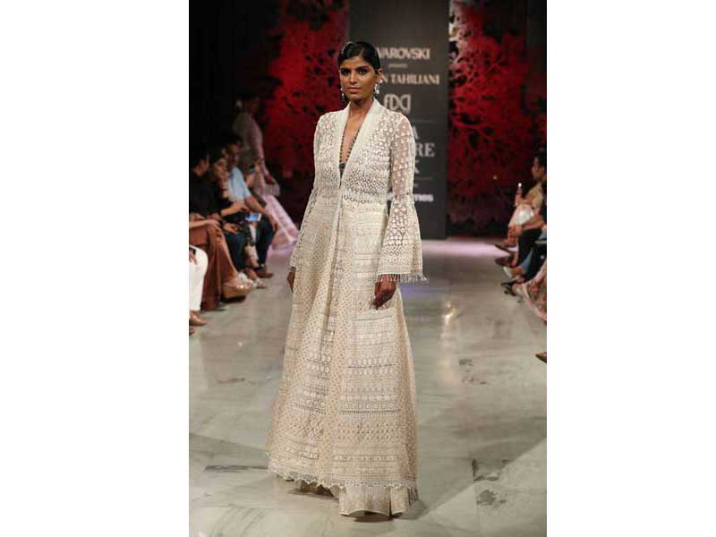 Models walk the ramp for Tarun Tahiliani's show