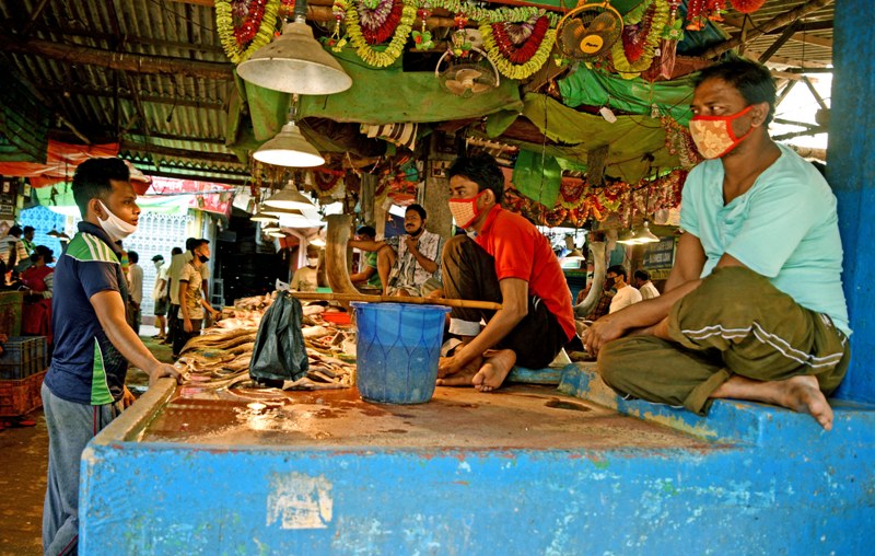 Kolkata in Lockdown: Deserted streets of downtown area and people in markets