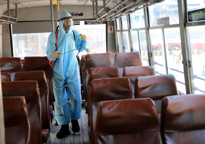 Buses to carry migrant workers get disinfected