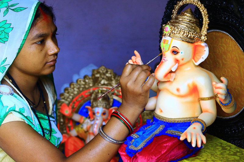 Artisans make Ganesha idol ahead of Ganesh Chaturthi
