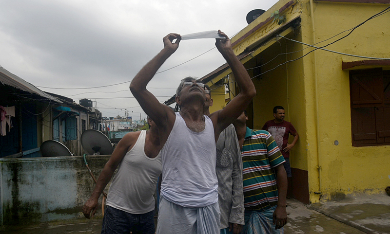 People watching solar eclipse in Kolkata