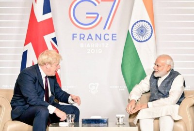 Prime Minister Narendra Modi speaks with Boris Johnson, discusses challenges posed by COVID-19 pandemic 