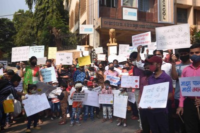 School students stage silent protest over their school fees in Mumbai on Wednesday.