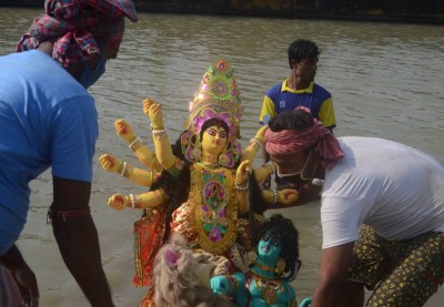Glimpses of immersion of Goddess Durga's idols at Kolkata's Babughat