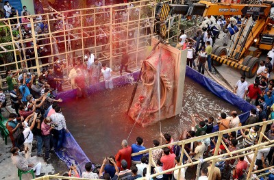 Unique Durga idol immersion in Kolkata by Tridhara Sammilani