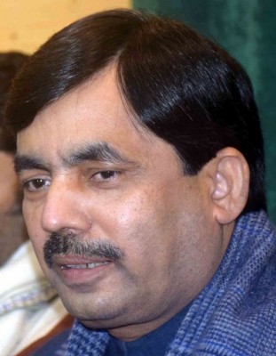 BJP Spokesperson Syed Shahnawaz Hussain addressing media at Kashmir press club in Srinagar