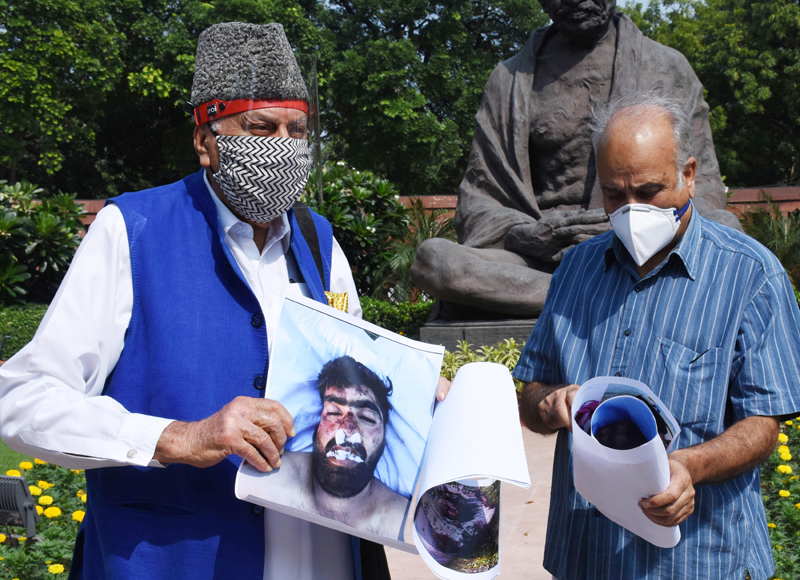 Farooq Abdullah, Hasnain Masoodi protest during Parliament’s monsoon session