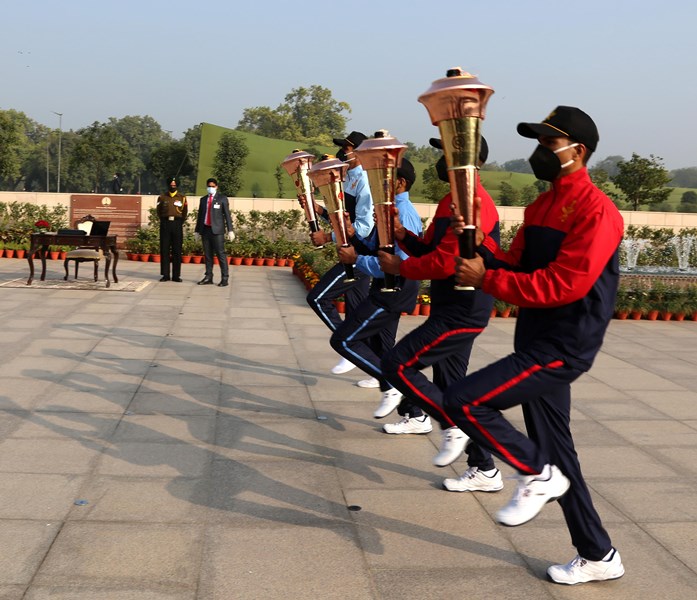 Soldiers carrying victory flames, lit-up by PM Modi, marking the beginning of Golden Jubilee of India's victory over Pakistan in Indo-Pak War
